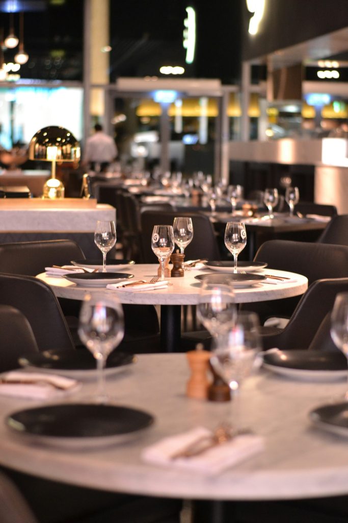 A restaurant table is set for dining.
